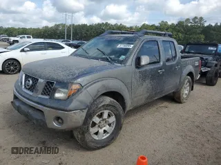 2007 Nissan Frontier Nismo with VIN 1N6AD07WX7C443426, listed as a Copart auction lot 57758095 with 166,433 mi miles and Salvage title. Bid and sale history available at DreamBid. Image 1.