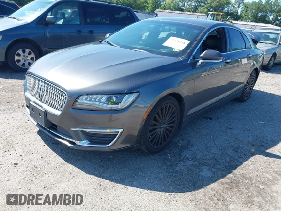 2017 Lincoln MKZ Reserve z VIN 3LN6L5E98HR653592, wystawiony jako IAAI lot #42531248 z przebiegiem 114 188 mil mil oraz . Historia ofert i sprzedaży dostępna na DreamBid. Obrazek 17.