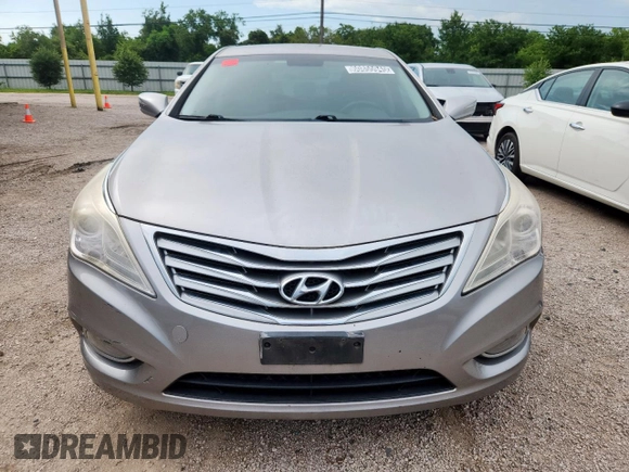 2013 Hyundai Azera z VIN KMHFG4JG9DA217664, wystawiony jako Copart lot #60855945 z przebiegiem 115 623 mil mil oraz Czysty tytuł • Clean title. Historia ofert i sprzedaży dostępna na DreamBid. Obrazek 5.