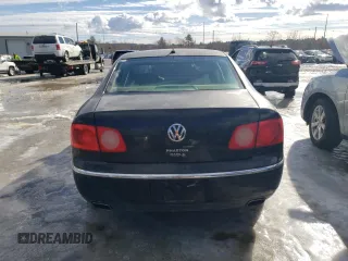 2004 Volkswagen Phaeton V8 z VIN WVWAF63D048011494, wystawiony jako Copart lot #43921145 z przebiegiem 129 758 mil mil oraz Tytuł czysty. Historia ofert i sprzedaży dostępna na DreamBid. Obrazek 6.