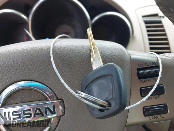 2006 Nissan Altima S with VIN 1N4AL11D56C159807, listed as a IAAI auction lot 42159319 with 293,144 mi miles and . Bid and sale history available at DreamBid. Image 11.