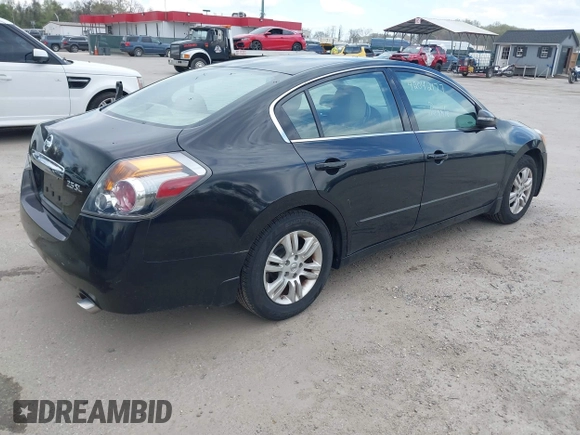 2011 Nissan Altima 2.5 S with VIN 1N4AL2AP7BC143909, listed as a IAAI auction lot 42042177 with 179,802 mi miles. Bid and sale history available at carsss.com. Image 4.
