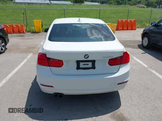 2014 BMW 3 Series 328i with VIN WBA3A5C5XEP602723, listed as a IAAI auction lot 42380748 with 127,492 mi miles and . Bid and sale history available at DreamBid. Image 16.