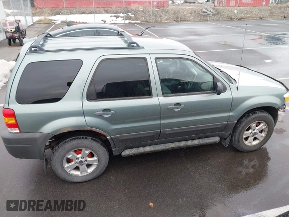 2006 Ford Escape XLT with VIN 1FMYU03126KC55897, listed as a IAAI auction lot 41733243 with 136,989 mi miles. Bid and sale history available at carsss.com. Image 13.