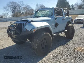 2012 Jeep Wrangler Sahara z VIN 1C4GJWBG8CL170148, wystawiony jako Copart lot #42392445 z przebiegiem 100 224 mil mil oraz Szkoda całkowita • Salvage title. Historia ofert i sprzedaży dostępna na DreamBid. Obrazek 1.
