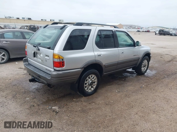2001 Honda Passport LX z VIN 4S6CK58W714414399, wystawiony jako IAAI lot #41641270 z przebiegiem 203 093 mil mil oraz . Historia ofert i sprzedaży dostępna na DreamBid. Obrazek 4.