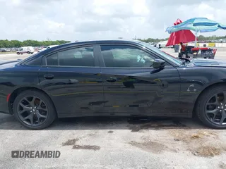 2020 Dodge Charger SXT z VIN 2C3CDXBG4LH238412, wystawiony jako IAAI lot #42494489 z przebiegiem 102 337 mil mil oraz . Historia ofert i sprzedaży dostępna na DreamBid. Obrazek 14.