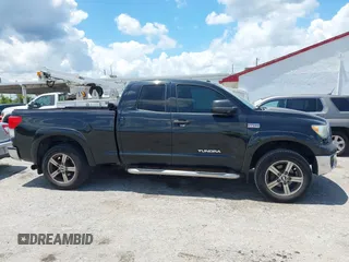 2012 Toyota Tundra z VIN 5TFRY5F17CX128888, wystawiony jako IAAI lot #42508395 z przebiegiem 279 524 mil mil oraz . Historia ofert i sprzedaży dostępna na DreamBid. Obrazek 13.