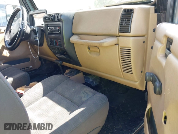 1998 Jeep Wrangler SE with VIN 1J4FY29P5WP793305, listed as a IAAI auction lot 42653372 with 190,047 mi miles and . Bid and sale history available at DreamBid. Image 5.