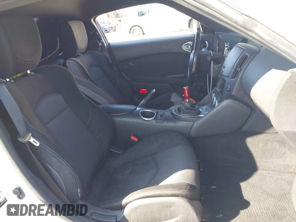 2018 Nissan 370Z Sport with VIN JN1AZ4EH3JM571169, listed as a IAAI auction lot 41859730 with 85,428 mi miles and . Bid and sale history available at DreamBid. Image 5.