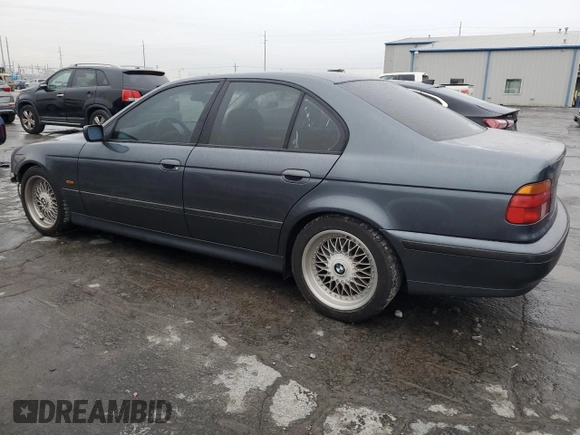2000 BMW 5 Series 528iA with VIN WBADM6349YGU22646, listed as a Copart auction lot 42733845 with 203,661 mi miles and Salvage Title. Bid and sale history available at carsss.com. Image 2.