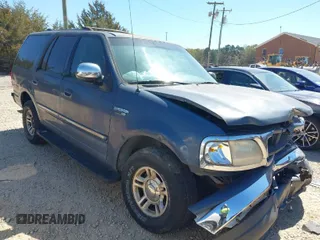 1999 Ford Expedition XLT z VIN 1FMRU1762XLB27932, wystawiony jako IAAI lot #41897682 z przebiegiem Nie podano mil oraz . Historia ofert i sprzedaży dostępna na DreamBid. Obrazek 1.