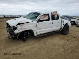 2015 Toyota Tacoma с VIN 3TMLU4EN9FM181313, выставлен на аукционе Copart как лот 53314455 с пробегом Не указан миль и Списание • Salvage title. История ставок и продаж доступна на DreamBid. Изображение 1.