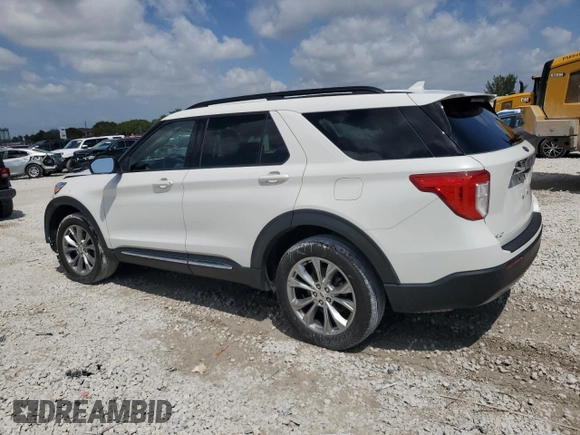 2022 Ford Explorer XLT with VIN 1FMSK8DH0NGB18321, listed as a Copart auction lot 50718605 with 21,047 mi miles and Salvage Title. Bid and sale history available at DreamBid. Image 2.