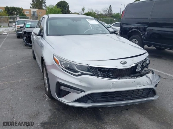 2019 Kia Optima LX with VIN 5XXGT4L3XKG285486, listed as a IAAI auction lot 41872981 with 101,981 mi miles. Bid and sale history available at carsss.com. Image 1.
