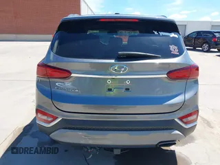 2019 Hyundai Santa Fe SE z VIN 5NMS23AD9KH037539, wystawiony jako IAAI lot #42221894 z przebiegiem 87 755 mil mil oraz . Historia ofert i sprzedaży dostępna na DreamBid. Obrazek 16.