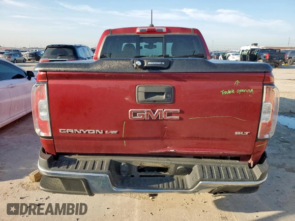 2017 GMC Canyon 2WD SLT z VIN 1GTG5DEN9H1305739, wystawiony jako Copart lot #58194755 z przebiegiem 133 571 mil mil oraz Szkoda całkowita • Salvage title. Historia ofert i sprzedaży dostępna na DreamBid. Obrazek 6.