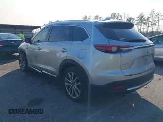 2017 Mazda CX-9 Grand Touring with VIN JM3TCADY5H0138176, listed as a IAAI auction lot 41458610 with 114,664 mi miles and . Bid and sale history available at DreamBid. Image 3.
