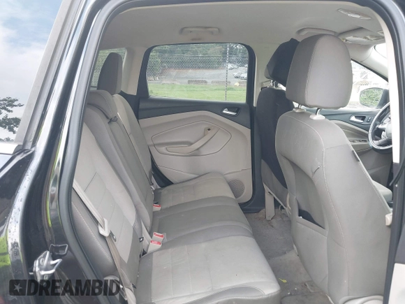 2013 Ford Escape SE with VIN 1FMCU0GX4DUA95161, listed as a IAAI auction lot 42393874 with 190,390 mi miles and . Bid and sale history available at DreamBid. Image 8.