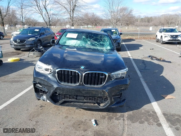 2020 BMW X4 M Competition with VIN 5YMUJ0C08LLA99688, listed as a IAAI auction lot 41226234 with 63,497 mi miles. Bid and sale history available at carsss.com. Image 11.
