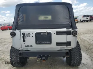 2008 Jeep Wrangler X z VIN 1J4FA24168L549082, wystawiony jako Copart lot #58178805 z przebiegiem 150 606 mil mil oraz Szkoda całkowita • Salvage title. Historia ofert i sprzedaży dostępna na DreamBid. Obrazek 6.