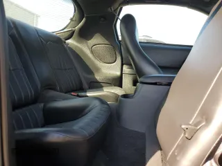 2001 Chevrolet Camaro Z28 z VIN 2G1FP22G712124948, wystawiony jako Copart lot #76083164 z przebiegiem 21 108 mil mil oraz Szkoda całkowita • Salvage title. Historia ofert i sprzedaży dostępna na DreamBid. Obrazek 10.