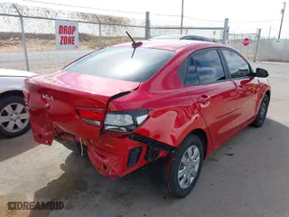 2023 Kia Rio S with VIN 3KPA24AD0PE549982, listed as a IAAI auction lot 41732215 with NaN miles. Bid and sale history available at carsss.com. Image 4.