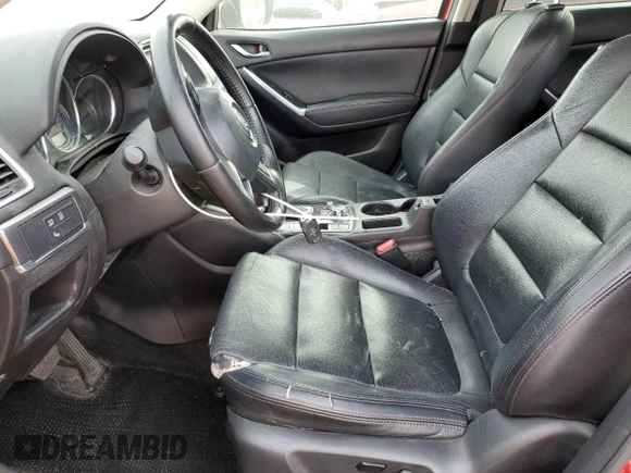 2016 Mazda CX-5 Grand Touring with VIN JM3KE4DY0G0820954, listed as a Copart auction lot 48027785 with 152,448 mi miles and Salvage Title. Bid and sale history available at carsss.com. Image 7.