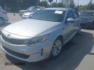 2018 Kia Optima LX with VIN 5XXGT4L31JG267716, listed as a IAAI auction lot 41890611 with 63,491 mi miles and . Bid and sale history available at carsss.com. Image 6.
