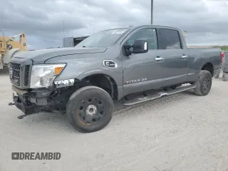 2016 Nissan Titan S z VIN 1N6BA1F14GN517646, wystawiony jako Copart lot #55381575 z przebiegiem 147 654 mil mil oraz Szkoda całkowita • Salvage title. Historia ofert i sprzedaży dostępna na DreamBid. Obrazek 1.
