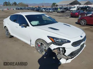 2020 Kia Stinger GT with VIN KNAE35LC7L6085529, listed as a IAAI auction lot 40671705 with 62,970 mi miles. Bid and sale history available at carsss.com. Image 1.