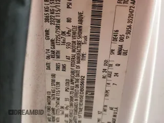 2014 Ford Econoline Cargo Commercial with VIN 1FTNE1EW5EDB05692, listed as a Copart auction lot 72186144 with 176,375 mi miles and Salvage title. Bid and sale history available at DreamBid. Image 13.