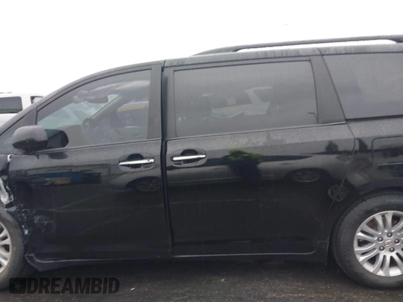 2011 Toyota Sienna XLE AAS with VIN 5TDYK3DC9BS068364, listed as a IAAI auction lot 41733881 with 157,972 mi miles. Bid and sale history available at carsss.com. Image 14.