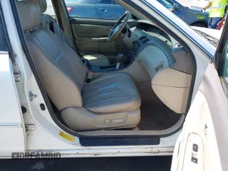 2001 Toyota Avalon XL z VIN 4T1BF28B51U139054, wystawiony jako IAAI lot #42223994 z przebiegiem 250 902 mil mil oraz . Historia ofert i sprzedaży dostępna na DreamBid. Obrazek 5.