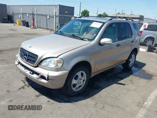 2004 Mercedes-Benz M 350 with VIN 4JGAB57E14A512245, listed as a IAAI auction lot 42452747 with 198,021 mi miles and . Bid and sale history available at DreamBid. Image 2.