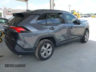 2023 Toyota RAV4 Hybrid LE with VIN JTMLWRFV6PD203044, listed as a IAAI auction lot 42320080 with 95,747 mi miles and . Bid and sale history available at DreamBid. Image 4.