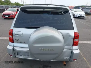 2005 Toyota RAV4 with VIN JTEGD20VX50047632, listed as a IAAI auction lot 41827122 with 214,716 mi miles. Bid and sale history available at carsss.com. Image 6.