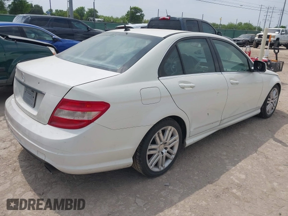 2009 Mercedes-Benz C-Class 3.0L Sport with VIN WDDGF54X39F200565, listed as a IAAI auction lot 42077156 with 169,248 mi miles. Bid and sale history available at carsss.com. Image 4.
