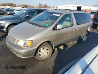 2002 Toyota Sienna LE with VIN 4T3ZF13C52U458553, listed as a Copart auction lot 77957754 with 164,058 mi miles and Salvage Title. Bid and sale history available at carsss.com. Image 1.