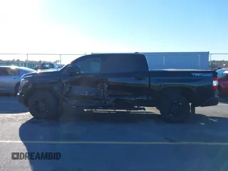 2021 Toyota Tundra SR5 with VIN 5TFDY5F13MX005925, listed as a IAAI auction lot 41352132 with 57,470 mi miles and . Bid and sale history available at DreamBid. Image 14.