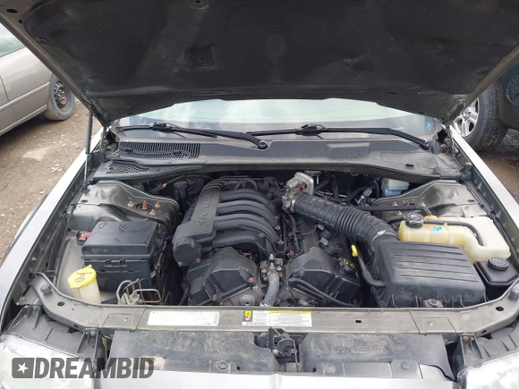 2009 Chrysler 300 LX with VIN 2C3KA43D49H558006, listed as a IAAI auction lot 42178195 with 208,864 mi miles and . Bid and sale history available at DreamBid. Image 10.