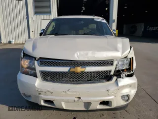 2013 Chevrolet Tahoe LTZ с VIN 1GNSCCE09DR317231, выставлен на аукционе Copart как лот 86056684 с пробегом 116 151 миль миль и Списание • Salvage title. История ставок и продаж доступна на DreamBid. Изображение 5.