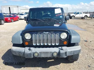2008 Jeep Wrangler Unlimited X with VIN 1J4GA39148L500904, listed as a IAAI auction lot 42434386 with 195,997 mi miles and . Bid and sale history available at DreamBid. Image 12.
