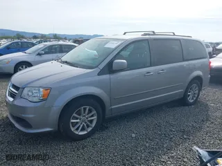 2015 Dodge Grand Caravan SXT with VIN 2C4RDGCG6FR556633, listed as a IAAI auction lot 42002783 with 157,341 mi miles. Bid and sale history available at carsss.com. Image 2.