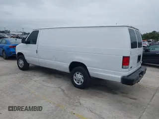 2002 Ford Econoline Cargo with VIN 1FTSS34L62HA53783, listed as a IAAI auction lot 41403058 with 306,576 mi miles and . Bid and sale history available at DreamBid. Image 3.
