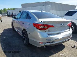 2015 Hyundai Sonata Sport with VIN 5NPE34AF6FH256579, listed as a IAAI auction lot 42052813 with 103,988 mi miles and . Bid and sale history available at DreamBid. Image 3.