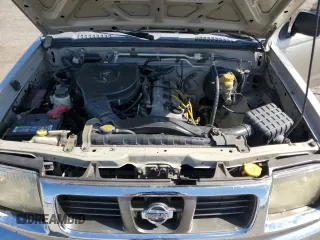 2000 Nissan Frontier XE with VIN 1N6DD26S7YC430643, listed as a Copart auction lot 59386765 with 204,851 mi miles and Salvage title. Bid and sale history available at DreamBid. Image 11.