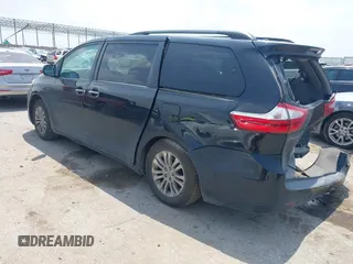 2016 Toyota Sienna XLE z VIN 5TDYK3DC5GS703586, wystawiony jako IAAI lot #42323587 z przebiegiem 127 640 mil mil oraz . Historia ofert i sprzedaży dostępna na DreamBid. Obrazek 3.