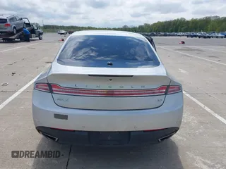 2015 Lincoln MKZ z VIN 3LN6L2GK5FR622117, wystawiony jako IAAI lot #42164455 z przebiegiem 167 156 mil mil oraz . Historia ofert i sprzedaży dostępna na DreamBid. Obrazek 16.