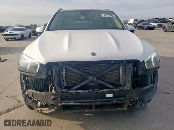 2023 Mercedes-Benz GLE 450 with VIN 4JGFB5KB5PA863344, listed as a Copart auction lot 49976145 with 57,077 mi miles and Salvage title. Bid and sale history available at DreamBid. Image 5.